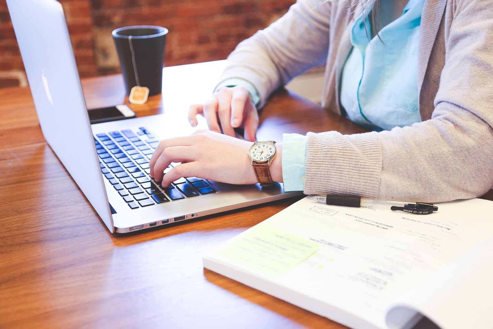 A marketer picking seo blog topics at a laptop